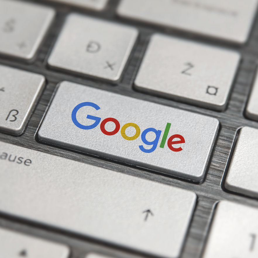 Tastatur mit Google Taste für Suchmaschinenwerbung der Leipziger Medien